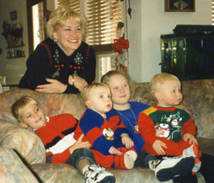 Alexander with his grandmother and his cousins